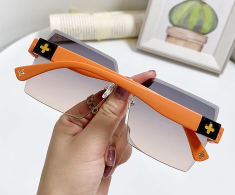 Солнцезащитные очки без оправы Section градиент серые с оранжевым фото