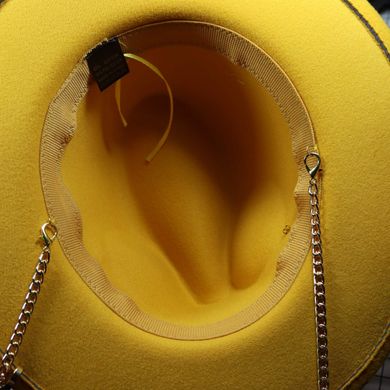 Капелюх жіночий Федора Calabria з металевим декором і ланцюжком жовта фото