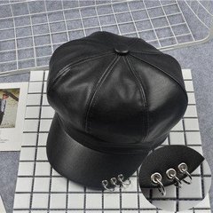 Женский картуз, кепи, фуражка с серебристыми кольцами из экокожи черный фото