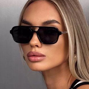 Сонцезахисні окуляри авіатор Celebrity з металевим завушником чорні фото
