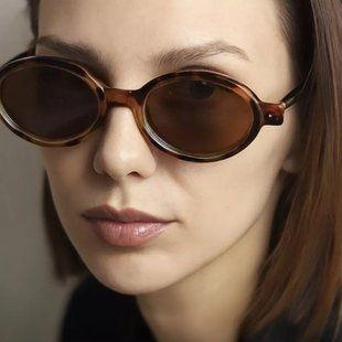 Солнцезащитные очки овальные Deluxe коричневые леопардовые фото