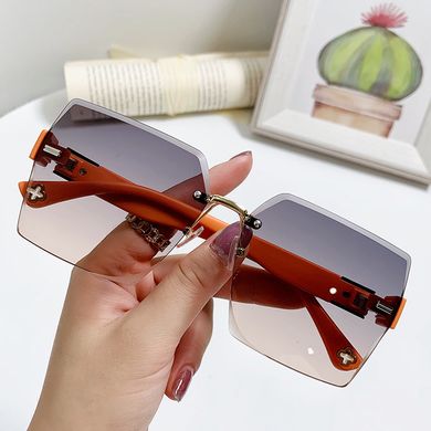 Сонцезахисні окуляри без оправи Section градієнт сірі з помаранчевим фото