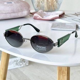 Солнцезащитные очки овальные Miu Oval черные с серебром и зеленым фото